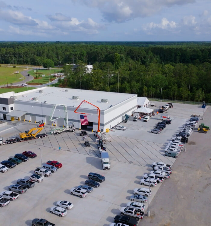 Aerial view of industrial building and parking lot