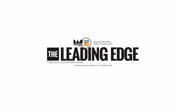 The Leading Edge logo with Wayne Brothers 40th anniversary emblem.