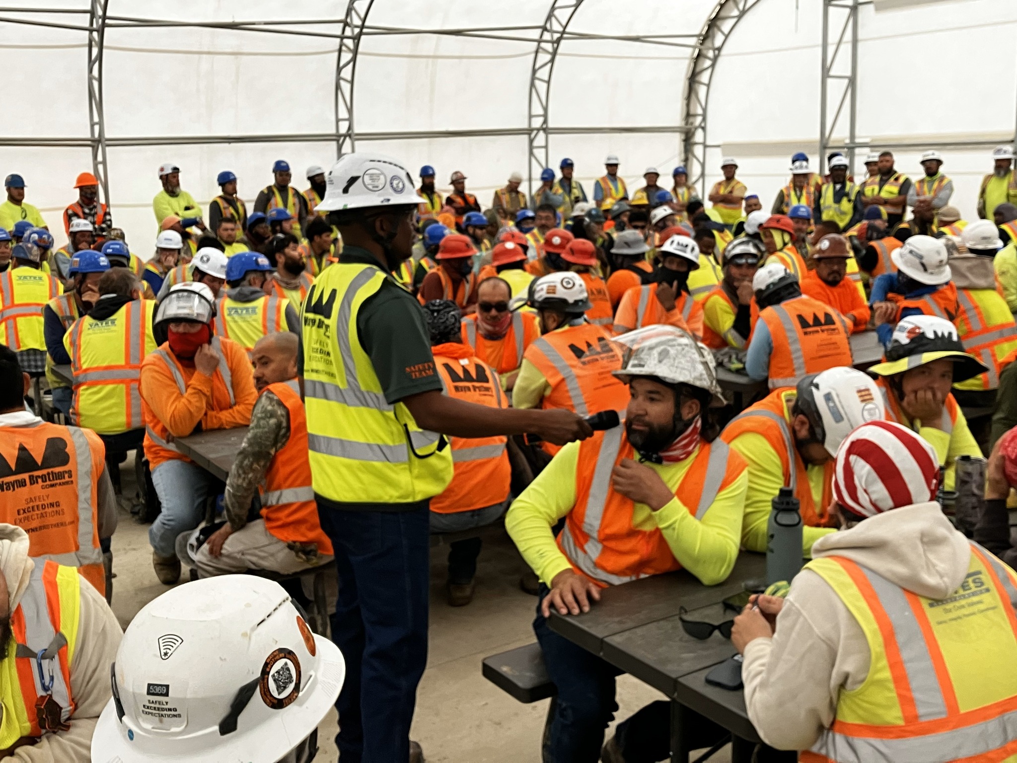 Wayne Brothers team members gathered for a safety meeting